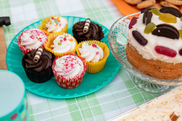 Community Bake Sale Close-up shot of cupcakes and cakes at a bake sale outdoors in the North East of England. Enjoy local sweets and treats stock pictures, royalty-free photos & images
