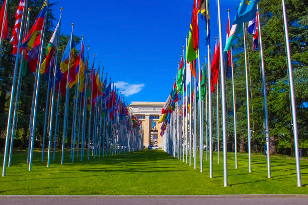 Gallery of national flags Geneva, Switzerland - June 17, 2016: Gallery of national flags at UN entrance in Geneva, Switzerland on June 17, 2016 Switzerland: Orderly and peaceful stock pictures, royalty-free photos & images